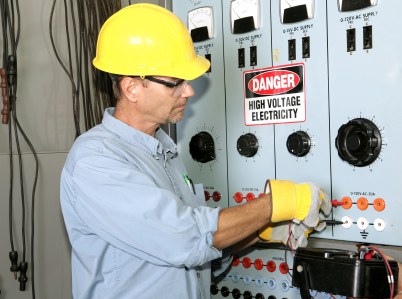 Tri-City Electric of North Carolina, LLC industrial electrician working with high voltage.